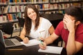 Studying and flirting at school Royalty Free Stock Photo