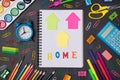 Studying at home concept. Top above overhead view photo of notebook and stationery isolated on blackboard