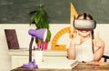 Studying in virtual reality. Modern technology. Interesting lesson. Homeschooling online. Girl kid study in virtual Royalty Free Stock Photo