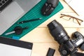 Stuff and gadgets on wooden desk Royalty Free Stock Photo