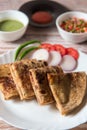 Stuffed aloo paratha or mashed potato served with condiments and curd. Royalty Free Stock Photo