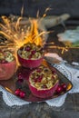 Stuffed baked red apples with granola, cranberries and marzipan Royalty Free Stock Photo