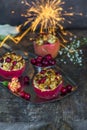Stuffed baked red apples with granola, cranberries and marzipan Royalty Free Stock Photo