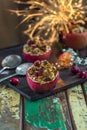 Stuffed baked red apples with granola, cranberries and marzipan Royalty Free Stock Photo