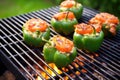 stuffed bell peppers in a bbq smoker