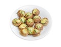 Stuffed button mushrooms on the white dish Royalty Free Stock Photo