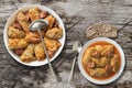 Stuffed Cabbage Meat Rolls Cooked In Stainless Sauce-pot And Served In Porcelain Plate Set On Old Garden Table Royalty Free Stock Photo