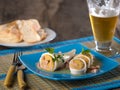 Stuffed Calamari squid on blue plate Royalty Free Stock Photo