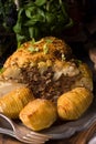 Stuffed cauliflower with mince and Hasselback potatoes