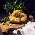 Stuffed cauliflower with mince and Hasselback potatoes