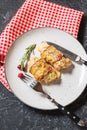 Stuffed chicken breast wrapped in bacon on a plate Royalty Free Stock Photo