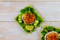 Stuffed clams with crabmeat and bread crumbs with salad and lemon. Seafood concept