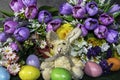 Stuffed Easter bunny and colored eggs