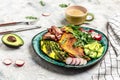 Stuffed egg omelette with vegetable, asparagus, fried egg, avocado, arugula, bacon ham and cheese. Low carb diet concept. high fat Royalty Free Stock Photo