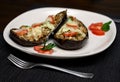 Stuffed eggplants on a plate served in a nice restaurant Royalty Free Stock Photo