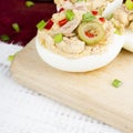 Stuffed eggs with tuna, olives and paprica