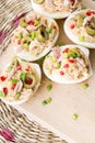 Stuffed eggs with tuna, olives and paprica