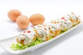 Stuffed eggs with tuna, tomato, mayonnaise and red pepper on white background Royalty Free Stock Photo