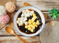 Stuffed fairy grass jelly in a bowl top view on wooden table taiwan food Royalty Free Stock Photo