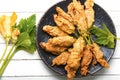 Stuffed fried zucchini flowers on the plate Royalty Free Stock Photo