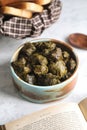 Stuffed Grape Leaves in a Bowl on a Table Royalty Free Stock Photo