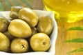 Stuffed green olives and olive oil macro Royalty Free Stock Photo