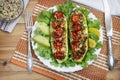 Stuffed with minced meat zucchini on a plate. Royalty Free Stock Photo