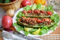 Stuffed with minced meat zucchini on a plate. Royalty Free Stock Photo