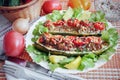 Stuffed with minced meat zucchini on a plate. Royalty Free Stock Photo