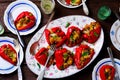 Stuffed Pepperoncini with a mozzarella, a pancetta and bread. Italian appetizer.