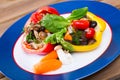 Stuffed peppers with mushrooms, rice, sesame, greens and vegetables Royalty Free Stock Photo