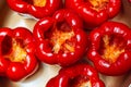 Stuffed peppers. Six large red bell peppers hollowed out ready to be stuffed Royalty Free Stock Photo