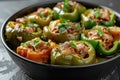 Stuffed peppers, tasty bell-peppers delicious cooked meal with meat greens