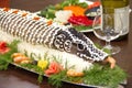 Stuffed pike on the served table