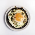 Stuffed portobello mushrooms with fried egg.