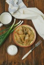 Stuffed Rolled Cabbage meat in Leaves in a Ceramic Plate with White Napkin,Parsley on a Rustic Wooden background. Traditional Roma Royalty Free Stock Photo