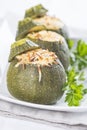 Stuffed round courgettes with grated cheese Royalty Free Stock Photo