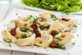 Stuffed tortellini with feta, basil and pine nuts Royalty Free Stock Photo