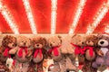 Stuffed toy bears on display awarded as winning prizes at Christmas funfair winter wonderland Royalty Free Stock Photo