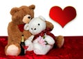 Stuffed Toy Bears in Romantic Mood for Valentin& x27;es Day. Large Red Heart for Text Royalty Free Stock Photo