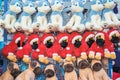 Stuffed toy dogs in Christmas theme on display awarded as wining prizes Royalty Free Stock Photo