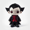 A stuffed vampire in black clothes