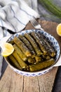 Stuffed vine leaves with lemon/sarma/dolma from Turkish and Greek cuisine Royalty Free Stock Photo