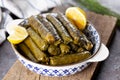 Stuffed vine leaves with lemon/sarma/dolma from Turkish and Greek cuisine Royalty Free Stock Photo