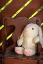 Stuffed white bunny on a rocking chair