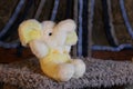 Stuffed white and yellow elephant