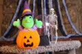 Stuffed witch inside carved pumpkin Royalty Free Stock Photo