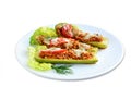 Stuffed zucchini boats filled with a sausage mixture topped with cheese. Ketogenic low-carb meal Royalty Free Stock Photo