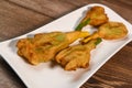 Stuffed zucchini flower on plate. Royalty Free Stock Photo