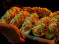 Stuffed zucchini with minced meat, tomatoes and cheese. Woman puts baking sheet with dish in oven for baking. Healthy Royalty Free Stock Photo